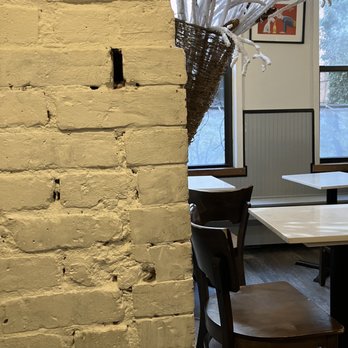 Charlotte Patisserie - a dining room with a brick wall - Desserts Near Me - Brooklyn, New York Charlotte Patisserie - a dining room with a brick wall - Desserts Near Me - Brooklyn, New York