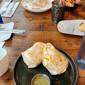 The Farm House - Breakfast burrito (cinnamon roll in background) - Southern Near Me - Nashville, Tennessee