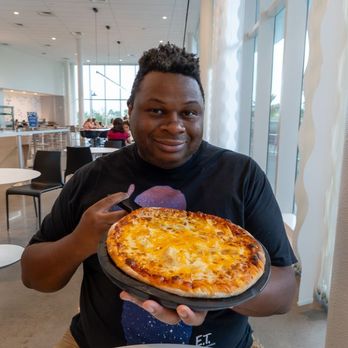 Universal Aventura Hotel - BBQ Chicken Pizza      Mozzarella, cheddar, rotisserie chicken, and spicy BBQ - Resorts Near Me - Orlando, Florida