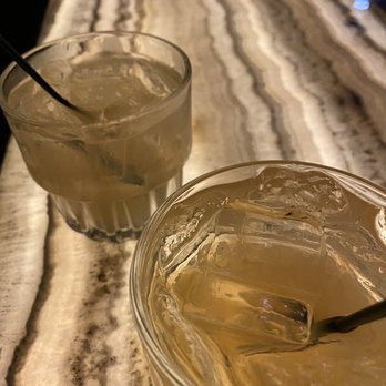 The Alley - two glasses of liquid and a spoon - Lounges Near Me - Carlsbad, California The Alley - two glasses of liquid and a spoon - Lounges Near Me - Carlsbad, California