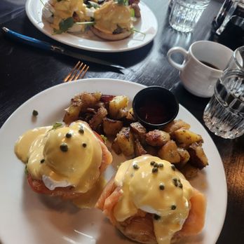 Le Sel Bistro - Salmon egg Benedict (bottom); crab cake Benedict (top) - Breakfast & Brunch Near Me - Tacoma, Washington Le Sel Bistro - Salmon egg Benedict (bottom); crab cake Benedict (top) - Breakfast & Brunch Near Me - Tacoma, Washington