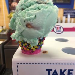 Baskin-Robbins - Pistachio Almond ice cream on a chocolate sprinkles waffle cone