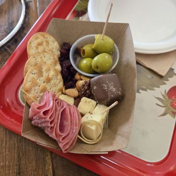 Oscar Carl Vineyard - Charcuterie boat - Wine Tasting Room Near Me - Sioux City, Iowa Oscar Carl Vineyard - Charcuterie boat - Wine Tasting Room Near Me - Sioux City, Iowa