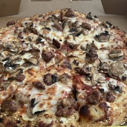 Hungry Howie's Pizza - Medium sausage and mushroom pizza.
