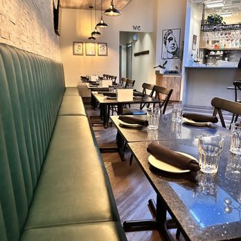 Mnimes Restaurant & Bar - tables and booths - Greek Near Me - Vancouver, British Columbia Mnimes Restaurant & Bar - tables and booths - Greek Near Me - Vancouver, British Columbia