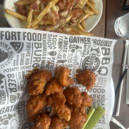 Boneless Wings - Single Cheese and bacon fries.