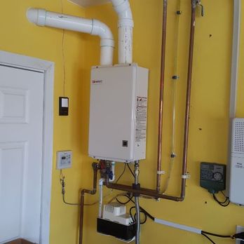 Tankless Solutions - Indoor Noritz with condensation pump allowing discharge5o remotely located drain - Water Heater Installation/Repair Near Me