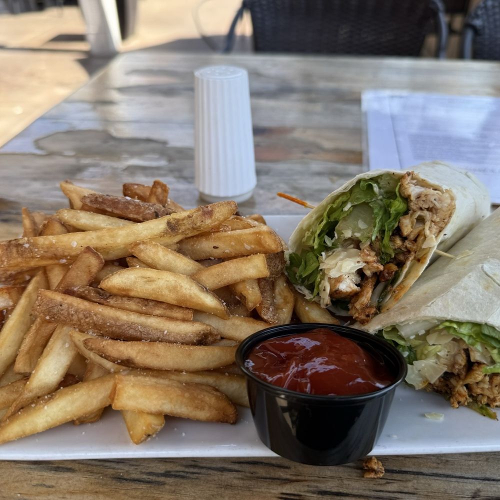 Oakley Pub and Grill - Blackened Chicken Caesar Wrap - Burgers Near Me - Cincinnati, Ohio Oakley Pub and Grill - Blackened Chicken Caesar Wrap - Burgers Near Me - Cincinnati, Ohio