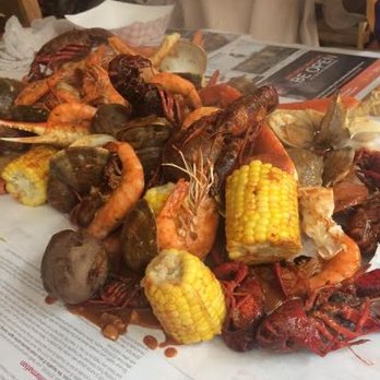 Claw Daddy's - Claw Feast Poured Out On the Table - Cajun/Creole Near Me - New York, New York Claw Daddy's - Claw Feast Poured Out On the Table - Cajun/Creole Near Me - New York, New York