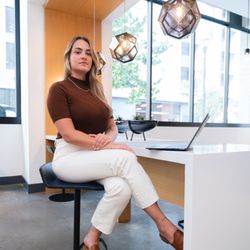 Chris Blossom Media - Professional woman poses for branding portrait