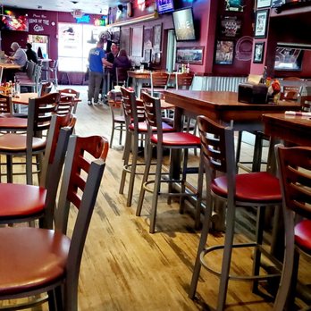 Press Box - tables and chairs in a restaurant - Pizza Near Me - Missoula, Montana Press Box - tables and chairs in a restaurant - Pizza Near Me - Missoula, Montana
