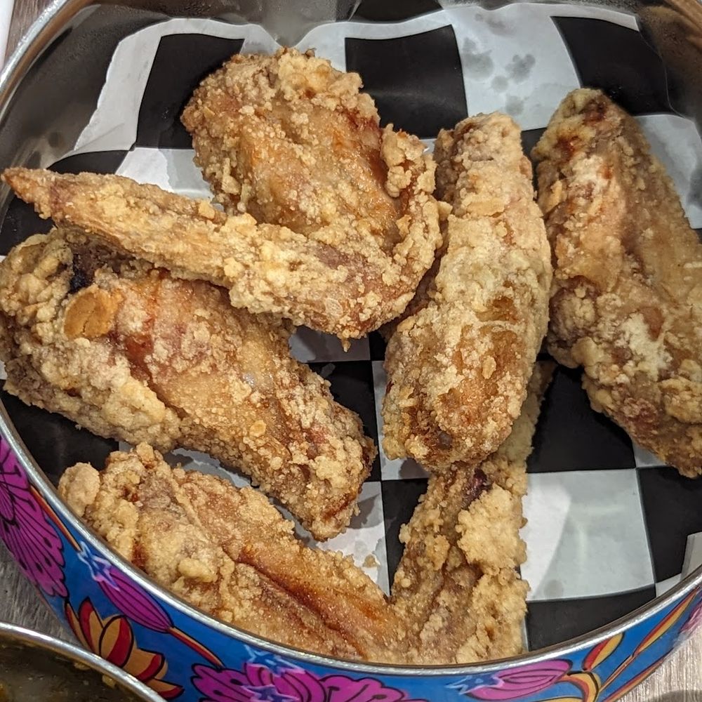 Shrimp paste-marinated chicken wings part of the Tingkat Trio! Shrimp paste-marinated chicken wings part of the Tingkat Trio!