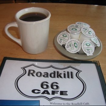 The Roadkill Cafe - I could not resist snapping this classic photo, which includes the classic menu, coffee, and artfully stacked creamer. - American Near Me - Seligman, Arizona The Roadkill Cafe - I could not resist snapping this classic photo, which includes the classic menu, coffee, and artfully stacked creamer. - American Near Me - Seligman, Arizona