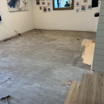 D&B Flooring Installation - The very start, pulling out the old flooring and preparing to level the floor - Demolition Services Near Me