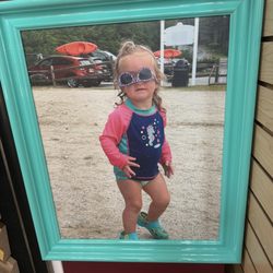 The Great Frame Up - My granddaughter at the beach framed in one of the many bright colored Roma frames.