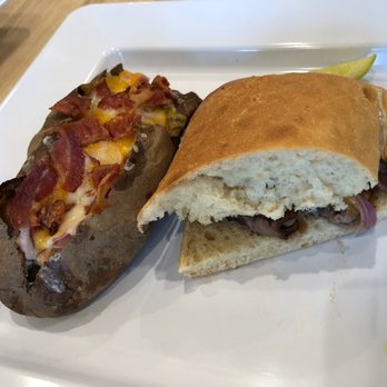 McAlister's Deli - Half sandwich and baked potato. The sandwich is even smaller than it looks in the picture and barely had any meat on it. - Delis Near Me - Cleveland, Tennessee McAlister's Deli - Half sandwich and baked potato. The sandwich is even smaller than it looks in the picture and barely had any meat on it. - Delis Near Me - Cleveland, Tennessee