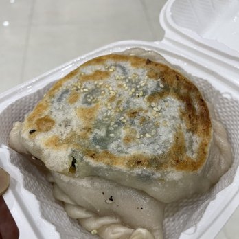 Old Street Pan Fried Dumpling 老街生煎 - $6 for two: Chive, egg, vermicelli "bun" pocket. Kind of like a empanada. Delicious! Huge! - Chinese Near Me - Flushing, New York