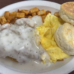 Nick's Pancake House - Country fried steak and biscuits with scrambled eggs and American fries