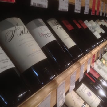 Wine Society - rows of wine bottles on a shelf - Beer, Wine & Spirits Near Me - Greenvale, New York Wine Society - rows of wine bottles on a shelf - Beer, Wine & Spirits Near Me - Greenvale, New York
