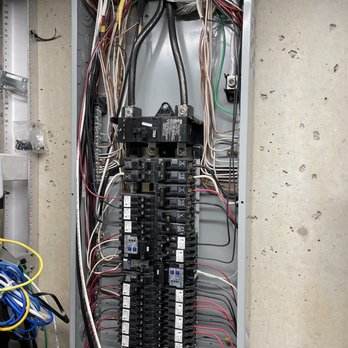 Power Up Lighting  - Adding the wires to the service panel - Electricians Near Me