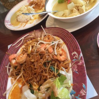 Thai Jasmine - Shrimp pad Thai with a side salad dressed in peanut sauce. Yellow curry in the back. - Thai Near Me - Gardnerville, Nevada Thai Jasmine - Shrimp pad Thai with a side salad dressed in peanut sauce. Yellow curry in the back. - Thai Near Me - Gardnerville, Nevada