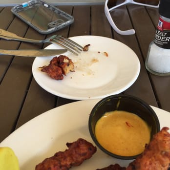 Marker 88 - A piece of plastic was found on the Conch Fritters. - Seafood Near Me - Islamorada, Florida Marker 88 - A piece of plastic was found on the Conch Fritters. - Seafood Near Me - Islamorada, Florida