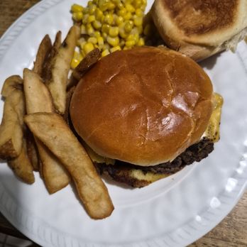Texas Roadhouse - Burger with the sides of fries, corn and their delicious bread - Steakhouses Near Me - Orlando, Florida Texas Roadhouse - Burger with the sides of fries, corn and their delicious bread - Steakhouses Near Me - Orlando, Florida