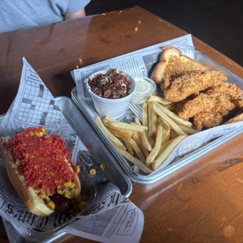 Bird Dog - Elote Dog and The mother clucker with loaded baked potato salad and fries. - Chicken Shop Near Me - San Marcos, Texas Bird Dog - Elote Dog and The mother clucker with loaded baked potato salad and fries. - Chicken Shop Near Me - San Marcos, Texas