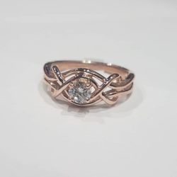 Forever Diamonds Jewelers - 14j rose gold "love knot" design ring with .30ct round brilliant cut diamond