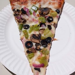 a slice of pizza on a paper plate a slice of pizza on a paper plate