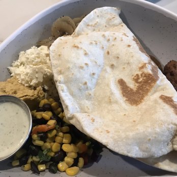 Pinched on the River - Rice bowl ($15.95) Falafel, hummus, feta cheese, black bean and corn, and sautéed onions - Mediterranean Near Me - Chicago, Illinois Pinched on the River - Rice bowl ($15.95) Falafel, hummus, feta cheese, black bean and corn, and sautéed onions - Mediterranean Near Me - Chicago, Illinois