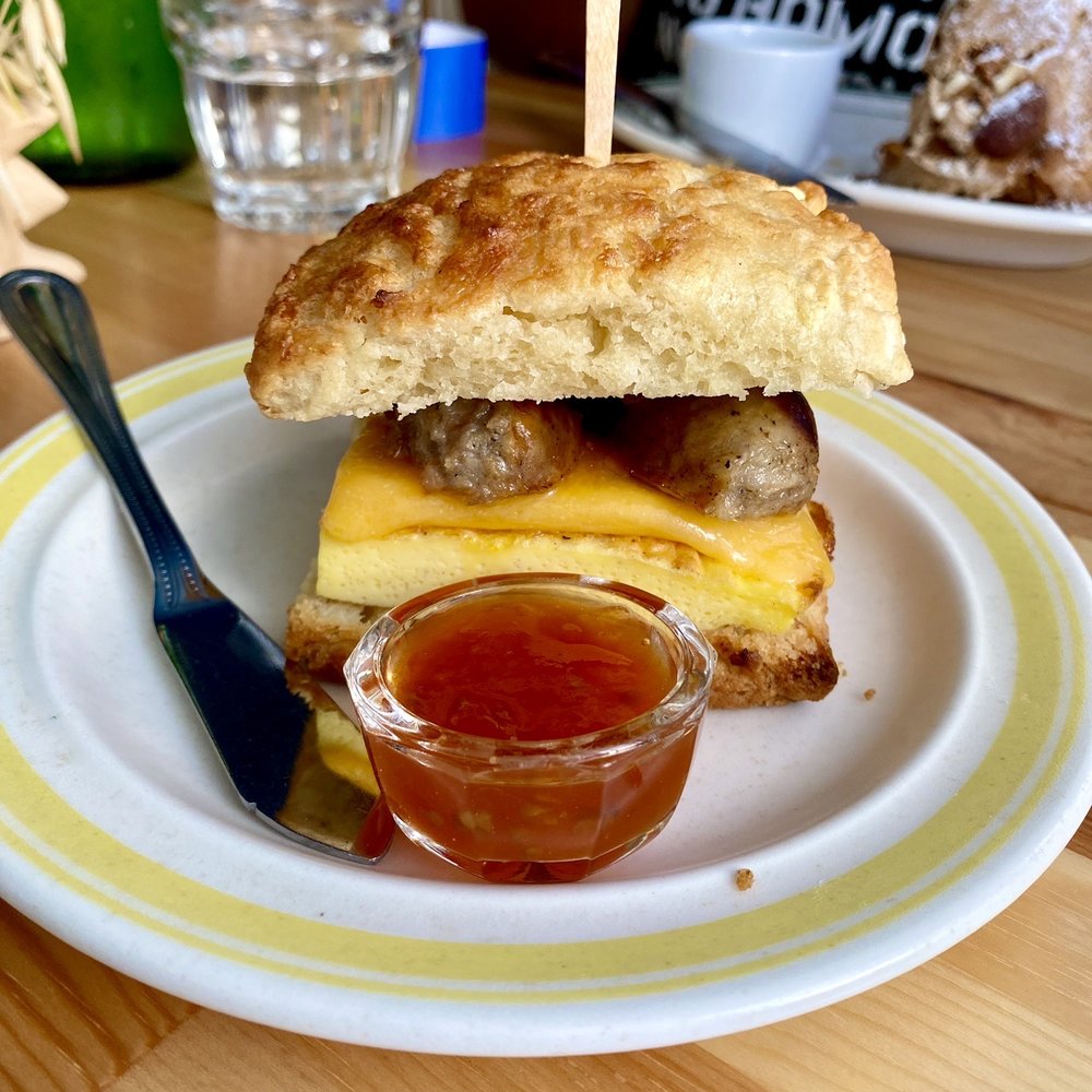 Biscuit with sausage, egg and cheese. The tomato jam was the star!! Biscuit with sausage, egg and cheese. The tomato jam was the star!!
