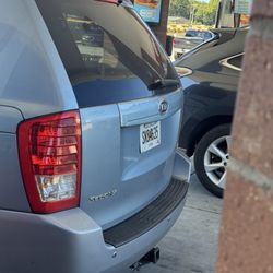 QuikTrip - Black hair lady, blue sweat pants ask for money. Parked pump 11