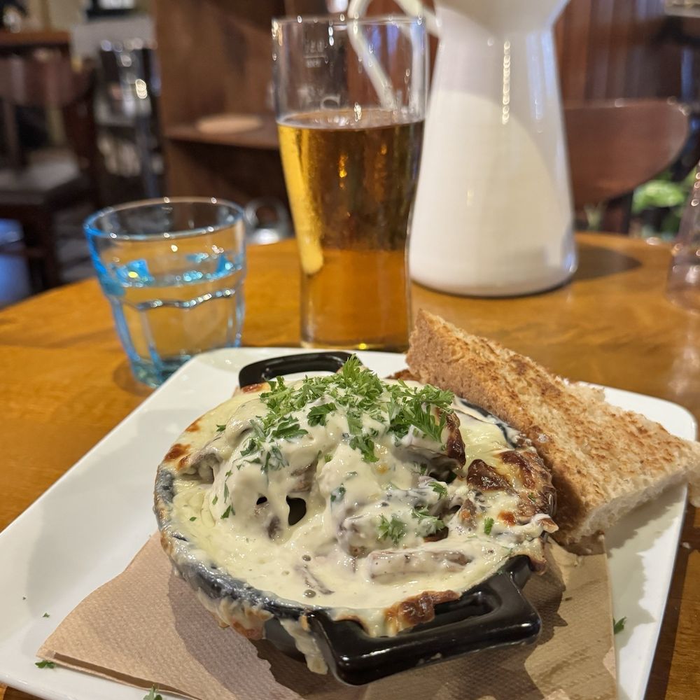 Kannas - Baked mushrooms with locally fresh baked bread - Pubs Near Me - Helsinki, 18 Kannas - Baked mushrooms with locally fresh baked bread - Pubs Near Me - Helsinki, 18