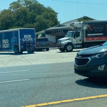 V Pizza + Tap Garden - People sitting on San Jose trying to understand why they blocked off parking - Pizza Near Me - Jacksonville, Florida