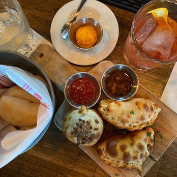 Bunbury - Amazing empanadas and a mezcal old fashioned. The orange-colored spread for the rolls was carrot and cream cheese based and was delish! - Argentine Near Me - Miami, Florida