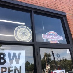 Illuminated Brew Works - Signs on window