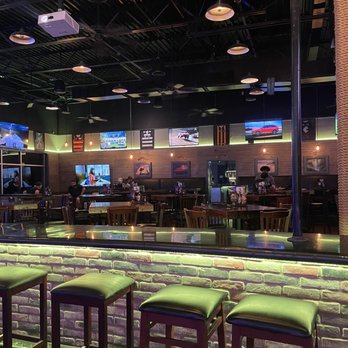 The Roo Pub - a row of bar stools - Pubs Near Me - San Antonio, Texas The Roo Pub - a row of bar stools - Pubs Near Me - San Antonio, Texas
