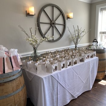Old Post Tavern - a table set up for a wedding reception - Bars Near Me - Fairfield, Connecticut Old Post Tavern - a table set up for a wedding reception - Bars Near Me - Fairfield, Connecticut
