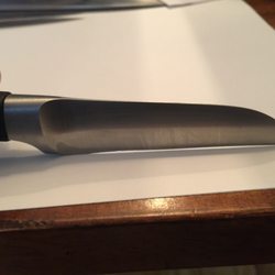 Photo of Mike & Son Sharpening Service - Brooklyn, NY, US. A Wusthof Sheep's Foot knife now no longer has a straight edge, but curves up in the center.