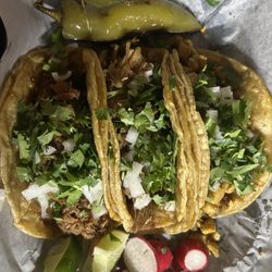 Taqueria el Paso - I ordered one pollo, one barbacoa, and one carnitas. Yummo!!