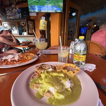 Cabo Cantina - Tarasco Style Eggs Fried eggs on a corn tortilla with grilled chicken covered in creamy poblano sauce. Refried beans and has browns - Sports Bars Near Me - Cabo San Lucas, BCS Cabo Cantina - Tarasco Style Eggs Fried eggs on a corn tortilla with grilled chicken covered in creamy poblano sauce. Refried beans and has browns - Sports Bars Near Me - Cabo San Lucas, BCS
