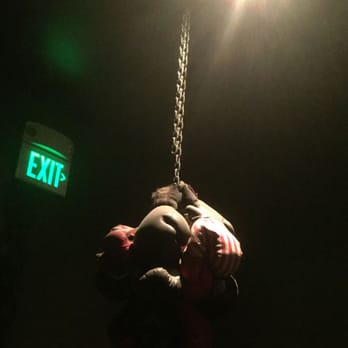 Prizefighter - a chain of old boxing gloves leads you to the bathrooms, below. - Bars Near Me - Emeryville, California Prizefighter - a chain of old boxing gloves leads you to the bathrooms, below. - Bars Near Me - Emeryville, California