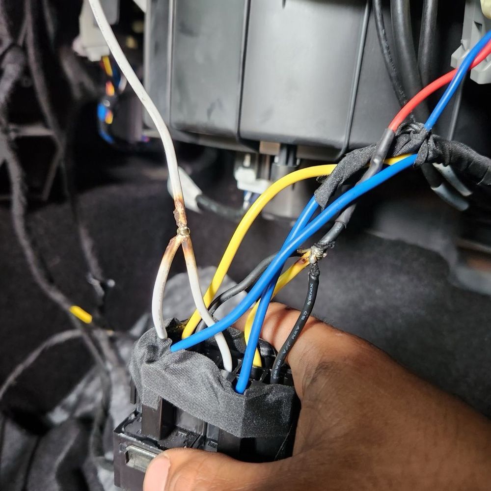 Custom Sounds & Tint - The mess of wires and bad solder points under hidden under their tape - Car Stereo Installation Near Me - San Antonio, Texas Custom Sounds & Tint - The mess of wires and bad solder points under hidden under their tape - Car Stereo Installation Near Me - San Antonio, Texas