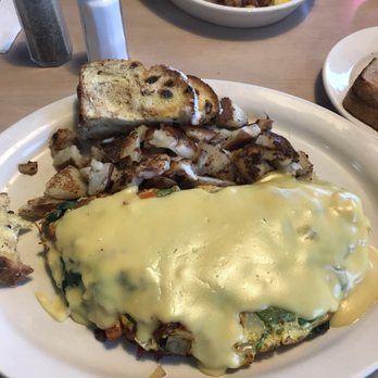 Gina's Cafe - Hollandaise omelette with side of home fries - Cafes Near Me - Clinton Township, Michigan
