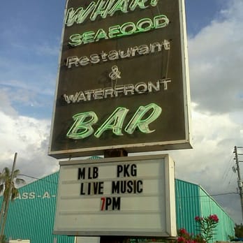 The Wharf - Signage on Gulf Blvd. - Seafood Near Me - St Pete Beach, Florida The Wharf - Signage on Gulf Blvd. - Seafood Near Me - St Pete Beach, Florida
