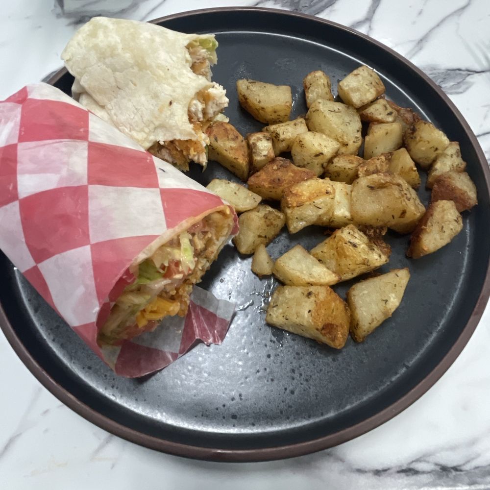 Frankie’s Restaurant - Buffalo chicken wrap and potatoes - Breakfast & Brunch Near Me - Evansville, Indiana Frankie’s Restaurant - Buffalo chicken wrap and potatoes - Breakfast & Brunch Near Me - Evansville, Indiana