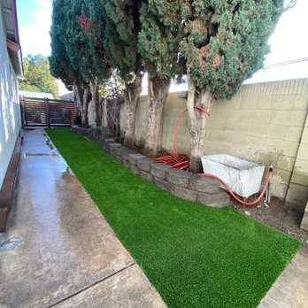 The Orange County Interlocking Paver Co - AFTER - Dog run, pet safe turf, and matching gate. The difference is night and day. - General Contractors Near Me - Newport Beach, California The Orange County Interlocking Paver Co - AFTER - Dog run, pet safe turf, and matching gate. The difference is night and day. - General Contractors Near Me - Newport Beach, California