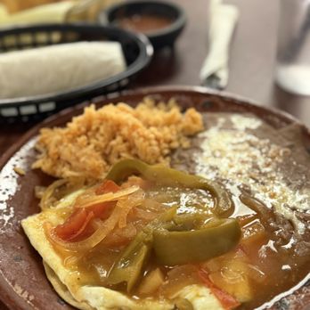 El Cantarito - $14 HUEVOS RANCHEROS. It was as authentic as you can get! I personally like a crispy tortilla, this one wasn't really. - Mexican Near Me - Placentia, California El Cantarito - $14 HUEVOS RANCHEROS. It was as authentic as you can get! I personally like a crispy tortilla, this one wasn't really. - Mexican Near Me - Placentia, California