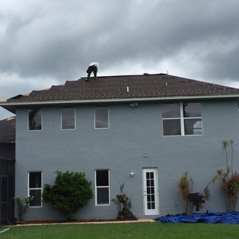 Southeast General Contractors Group - a man on the roof of a house - General Contractors Near Me - Port St. Lucie, Florida Southeast General Contractors Group - a man on the roof of a house - General Contractors Near Me - Port St. Lucie, Florida